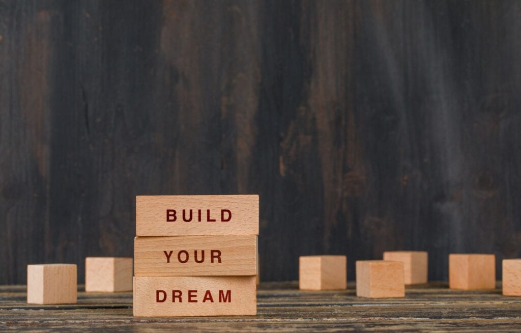 Build your Pilates Business Dream wooden blocks.